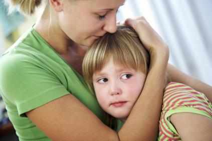 "Mother consoling daughter"